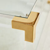 Glass and brass coffee table