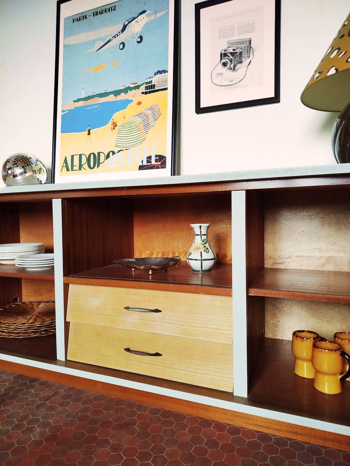 Wooden sideboard in soft green