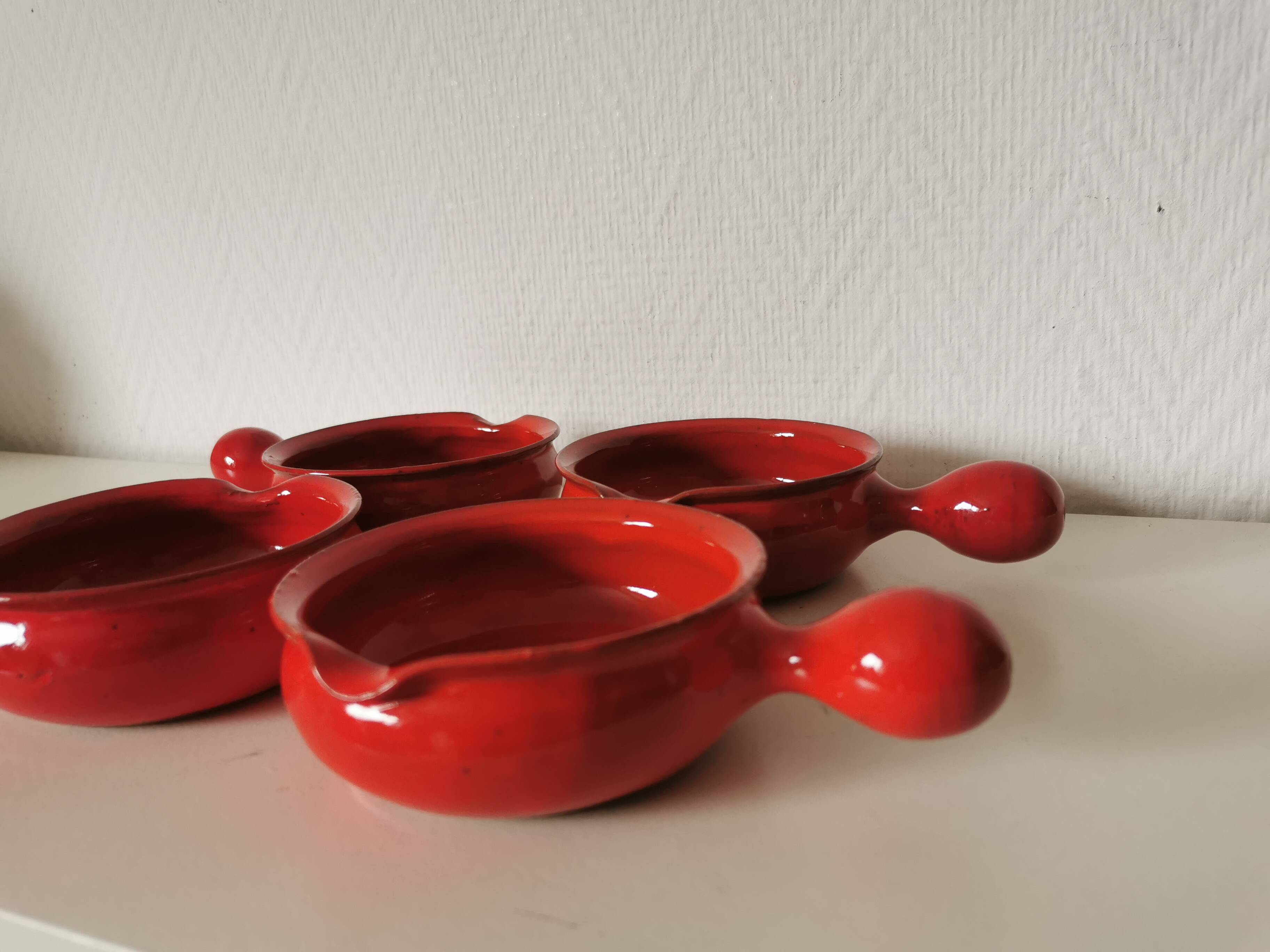 set of 4 red enamelled terracotta casseroles