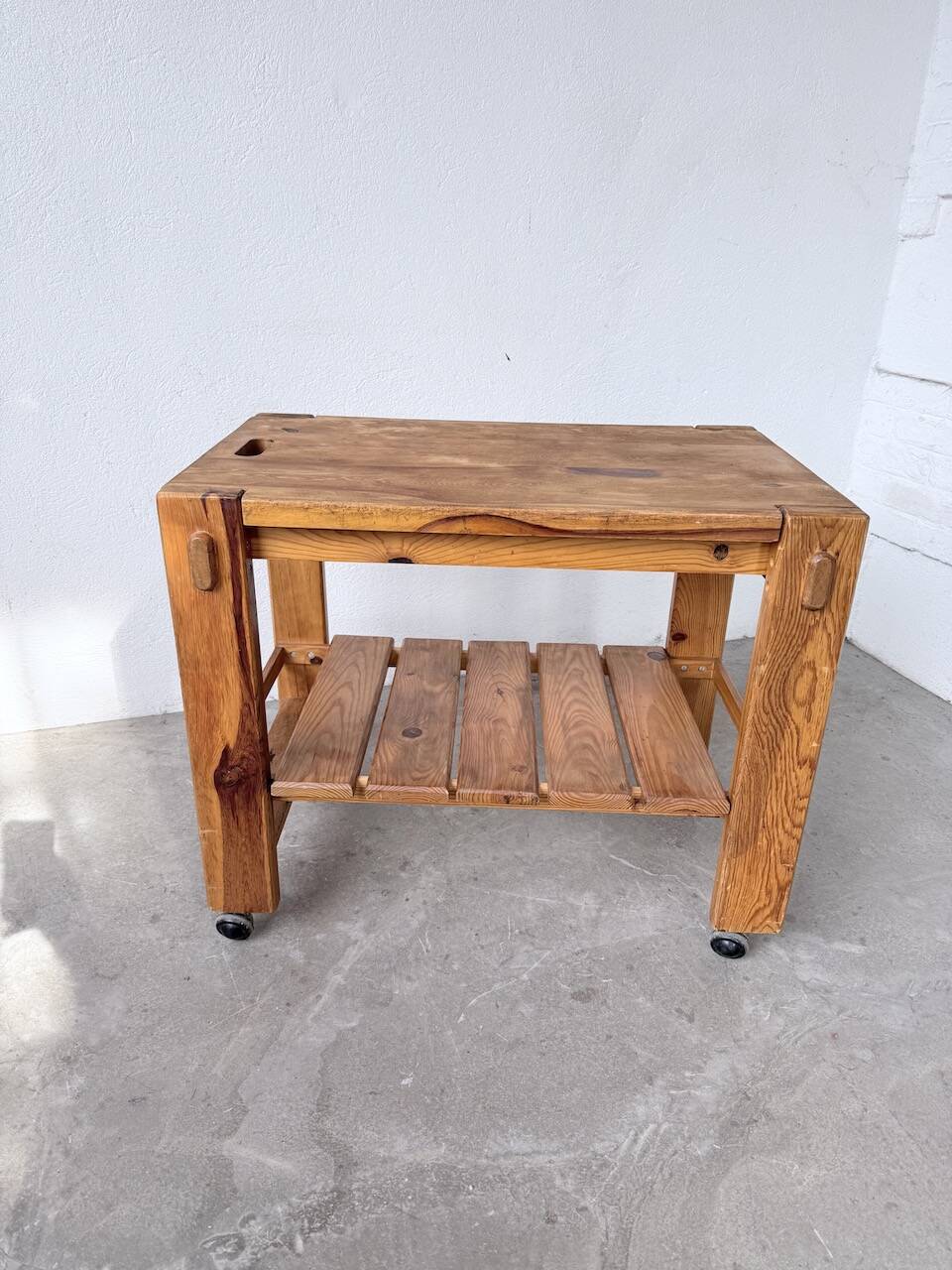 1980 pine wheeled console table