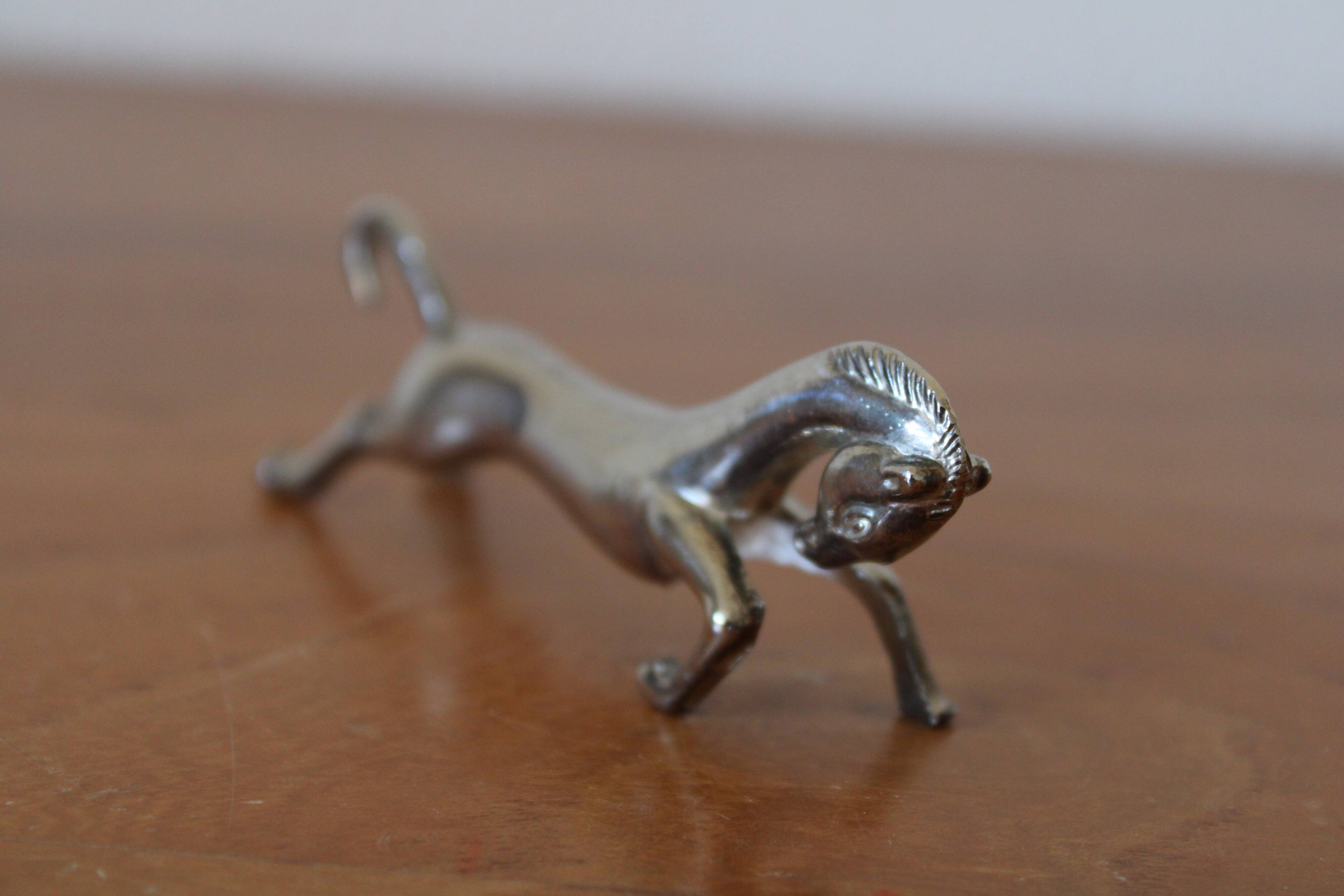 Set of 12 vintage knife rests, in silver metal