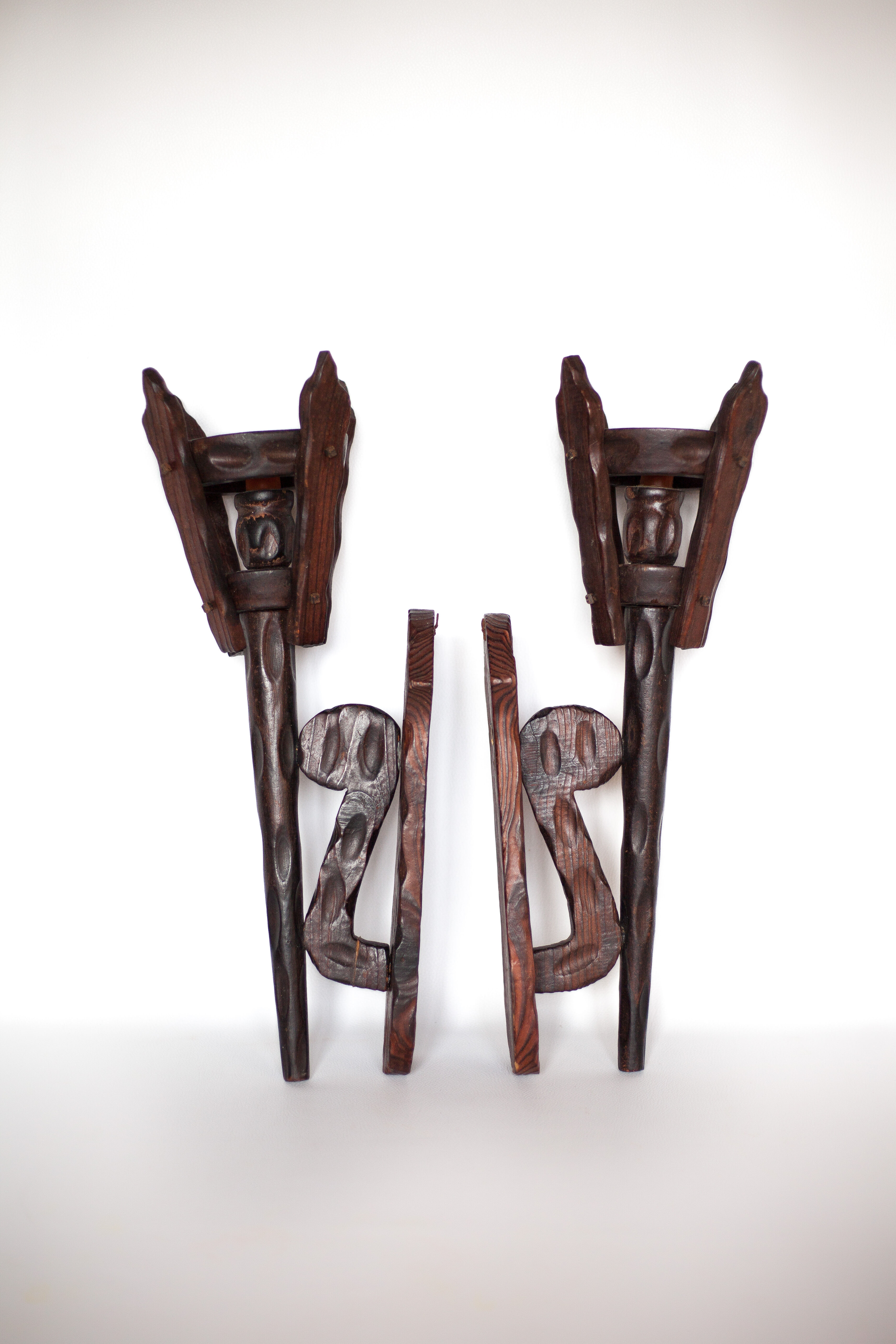 Pair of brutalist wood candle holders