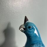 Porcelain parrot statuette