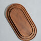 Trio of oval teak trays or cups