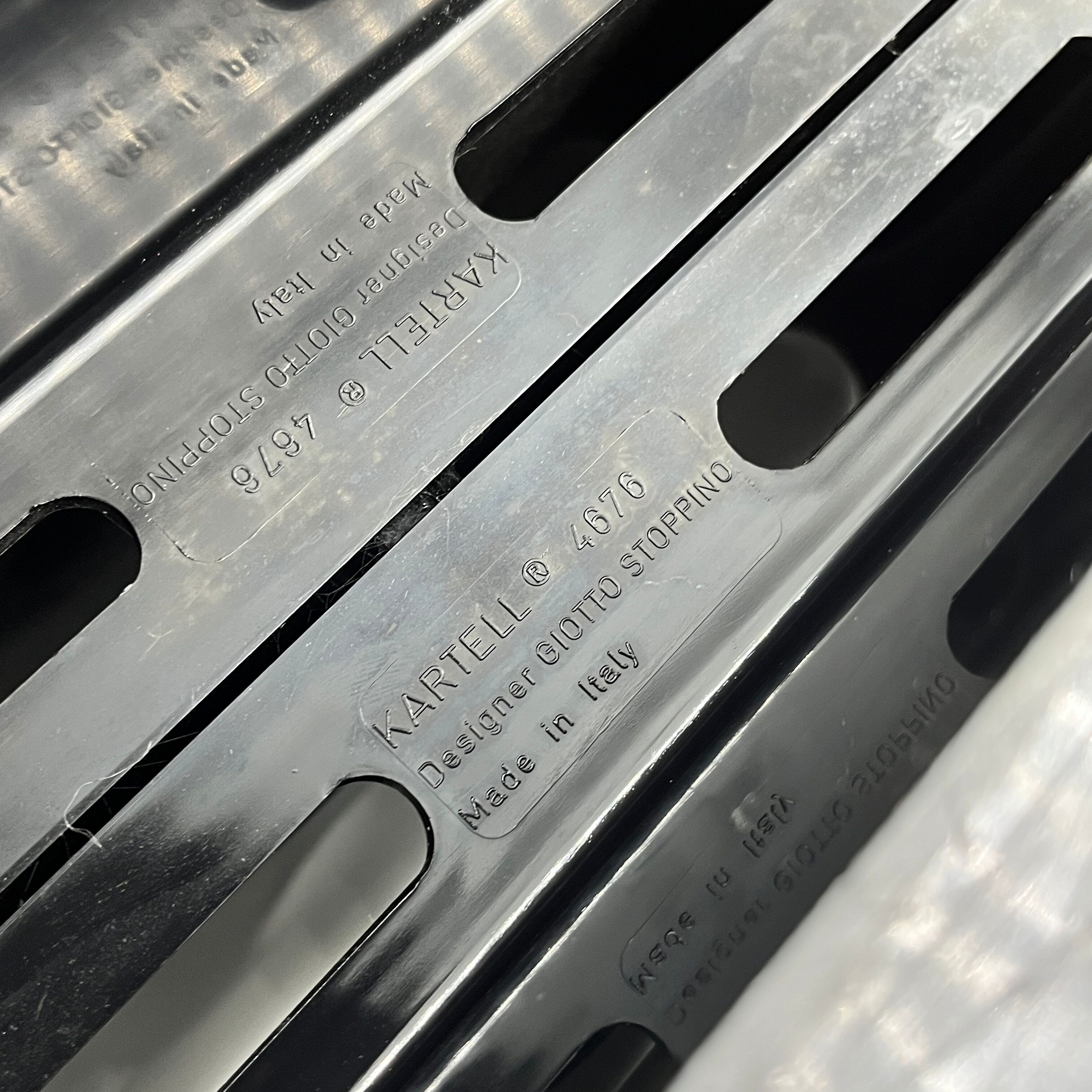 Kartell magazine holder model 4676 by Giotto Stoppino