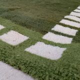 Handwoven Moroccan rug, natural wool, 250cm x 150cm, elegant decoration.