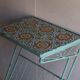 Metal plant stand with tiled top – 6 antique tiles