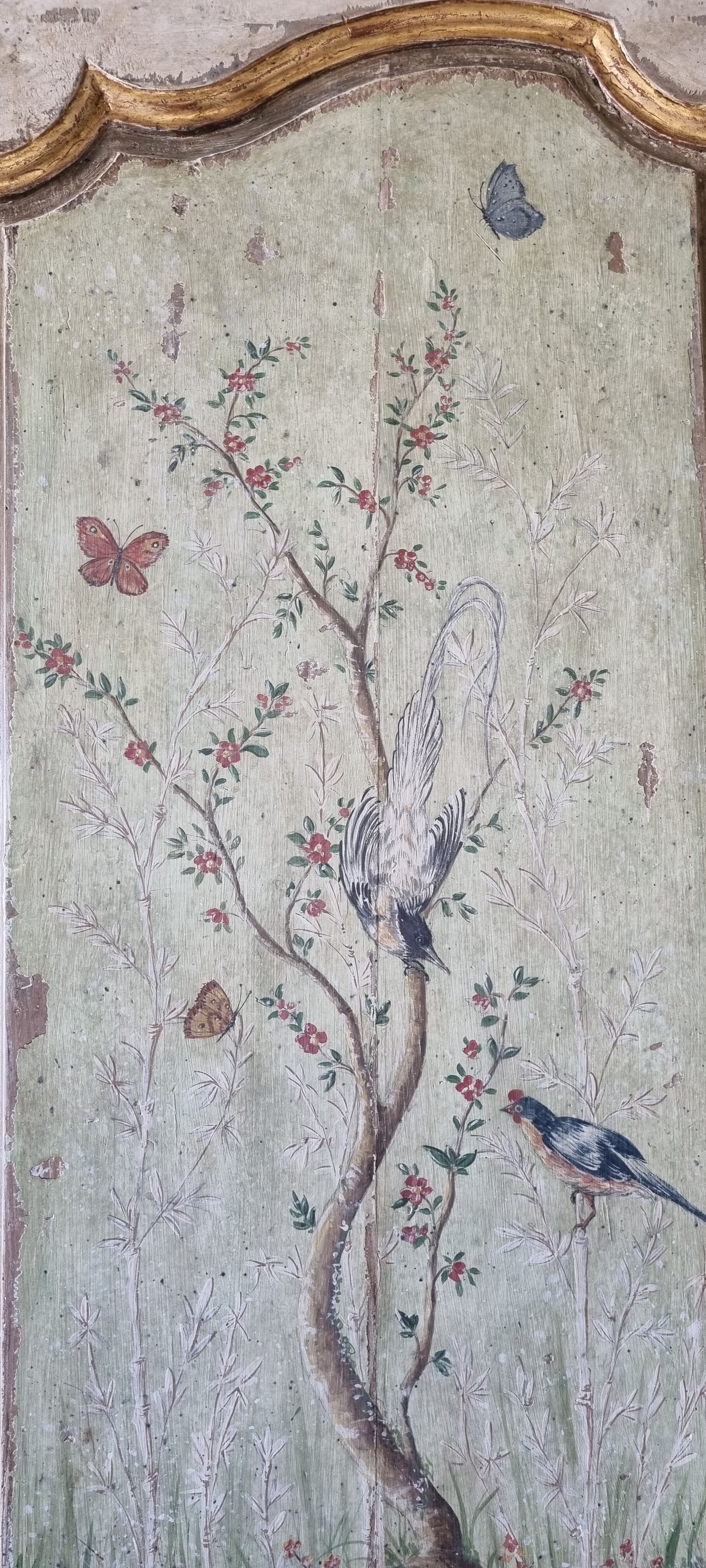 Pair of 18th painted panels and décor