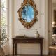 Large oval gold mirror, Louis XV rococo style, late 19th century, 114 x 66 cm.