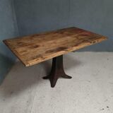 Old table on cast iron machine leg