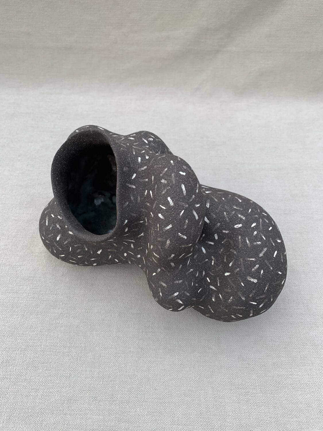 Raw black stoneware vase