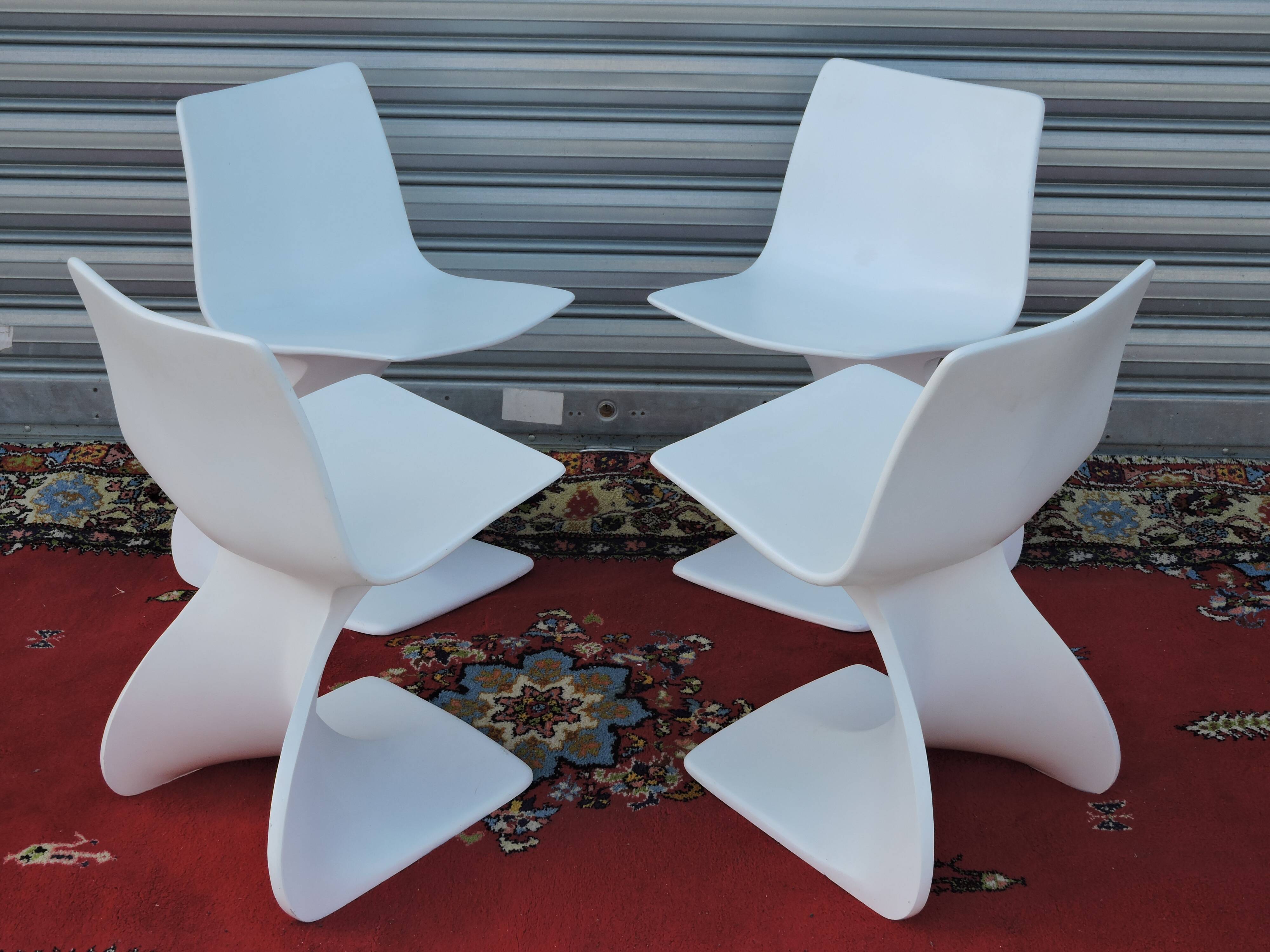 Set of four chairs " Naila " by Christian Adam. Edition Newform