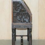 Chinese hand-carved desk from around 1940 with matching chair.