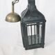 Old chandelier hanging lantern with candle in sheet metal