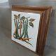 Dessous de plat ancien avec motif botanique