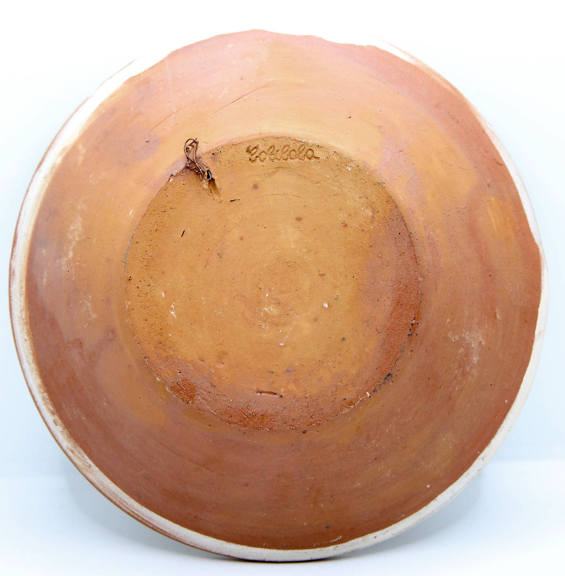 Handmade plate with moon and sun in Romania