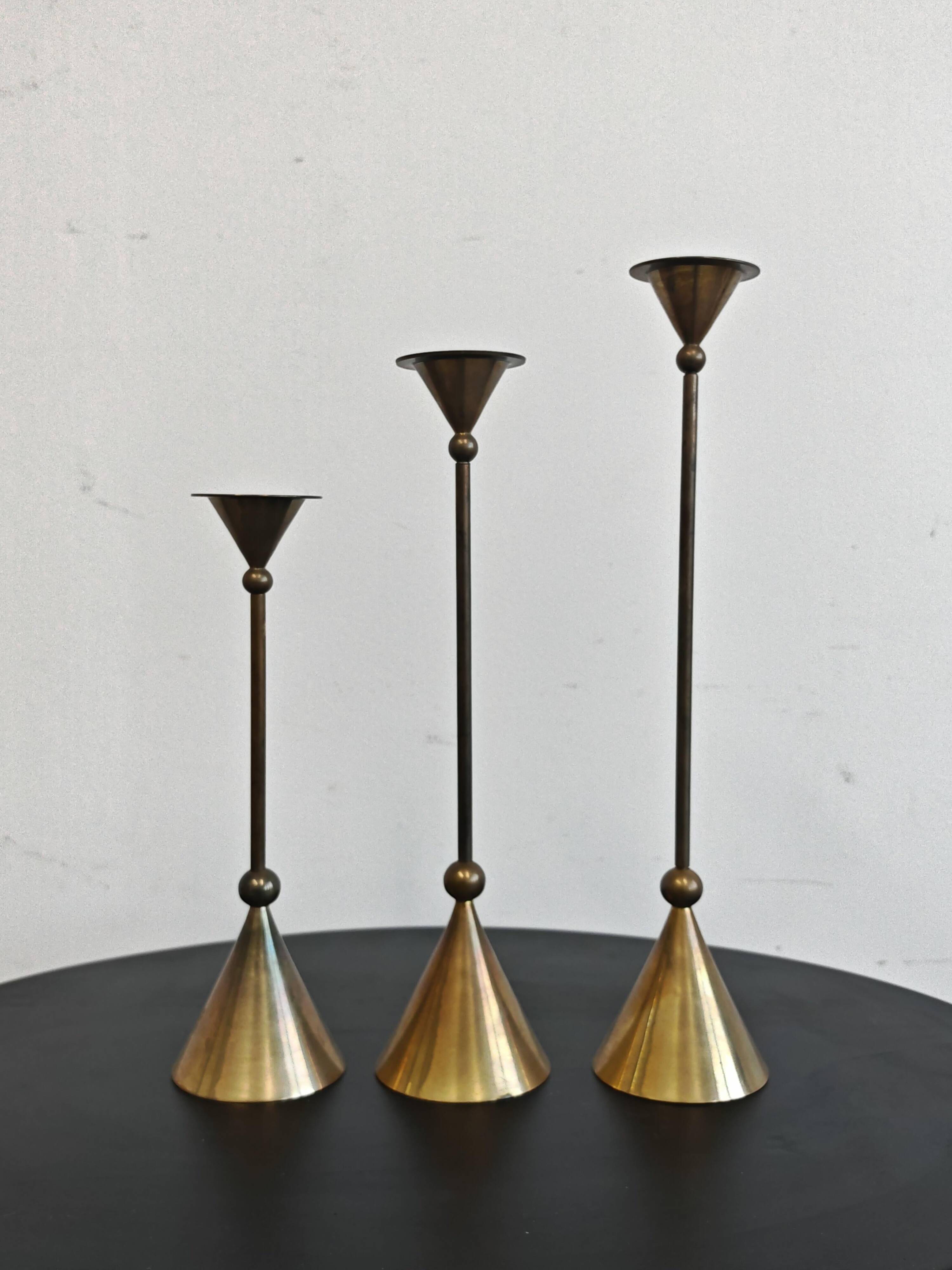 Set of three bronze candlesticks by Christian de Beaumont from the 1980s.