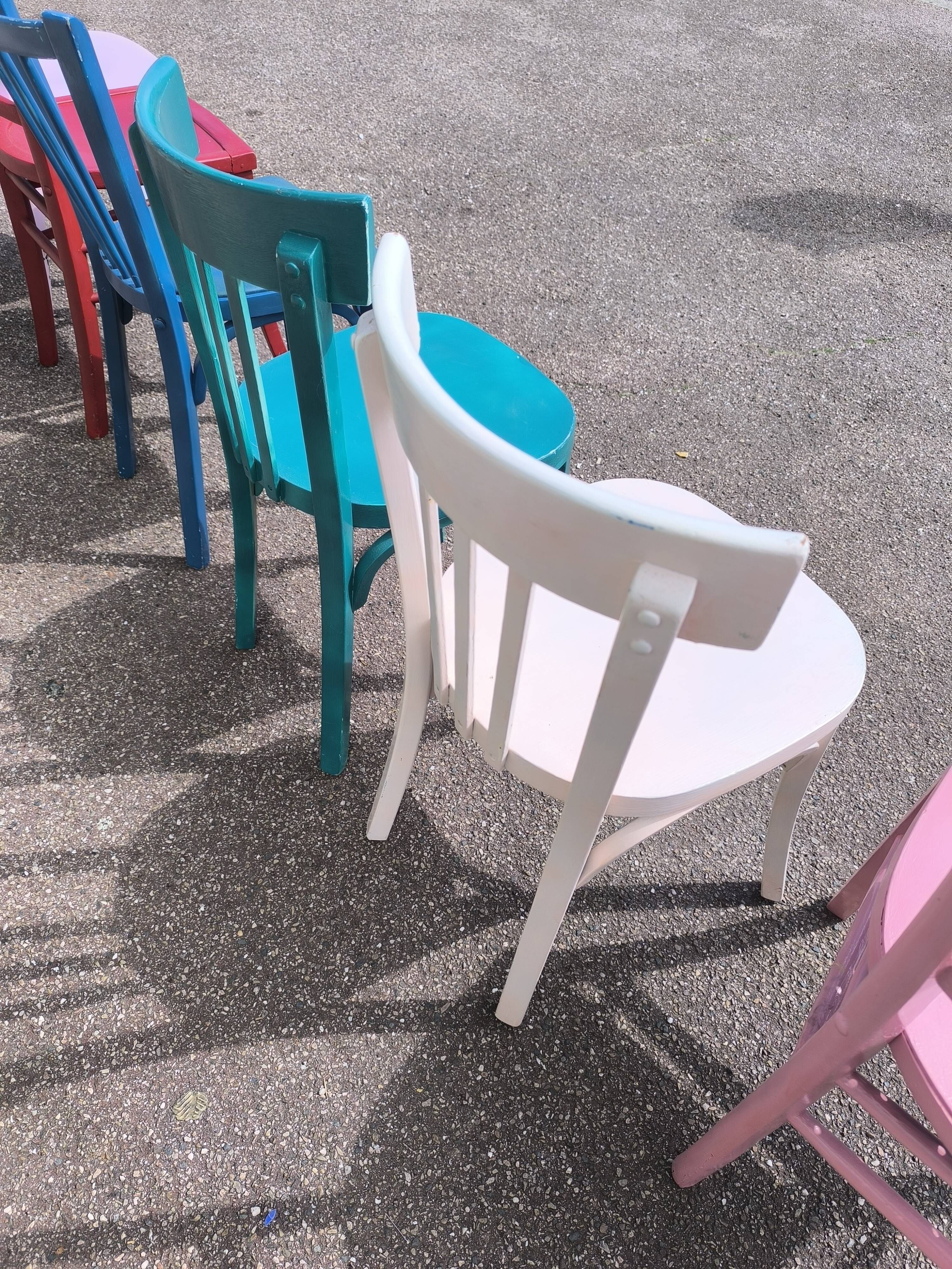 Set of 6 mismatched vintage bistro wooden chairs.