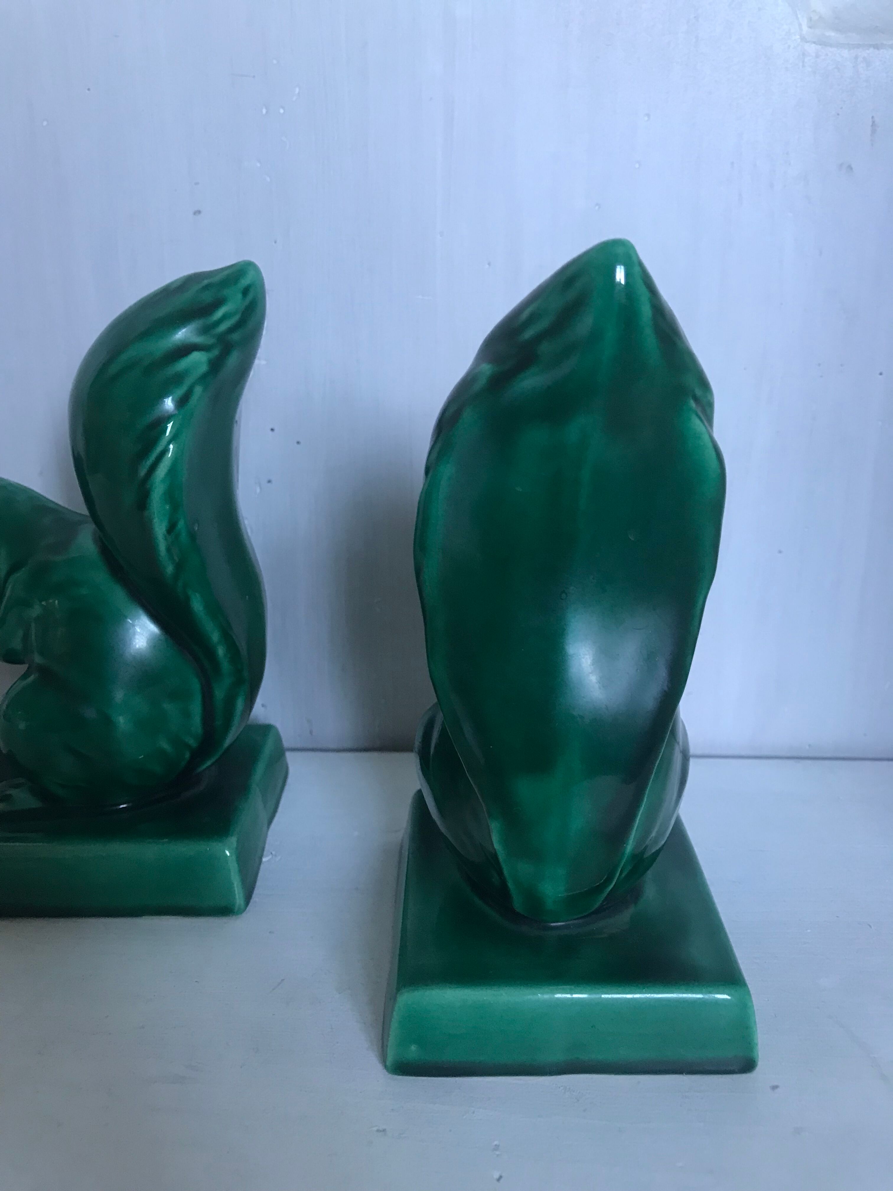 Pair of Art Deco ceramic book clamts