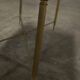 Marble coffee table with brass legs, height 46 cm.