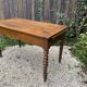 Old kitchen table with chopping board