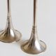 Duo of silver-plated brass candlesticks, 1950s/1960s