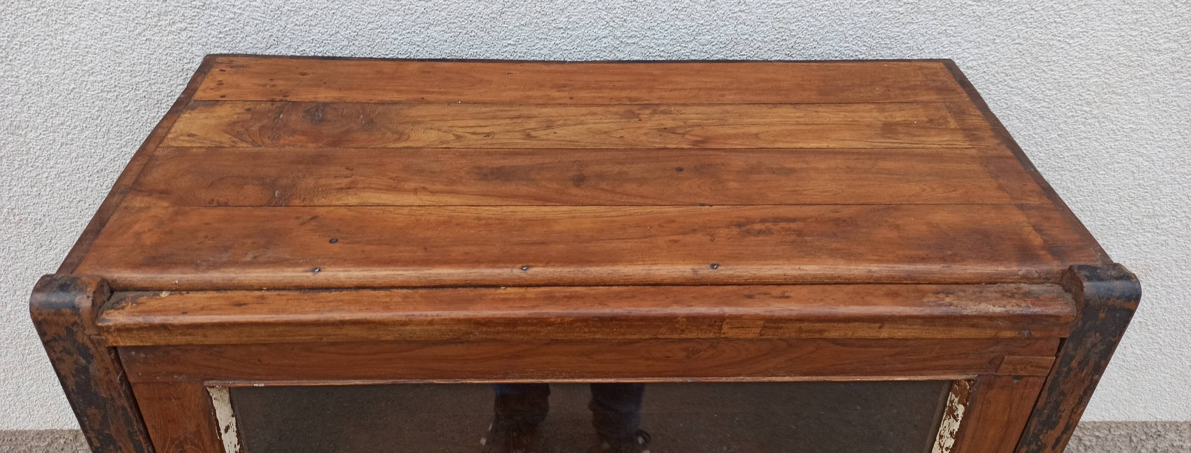 Small wooden glass cabinet with retractable door