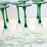 8 large green stem champagne flutes in very good condition.
