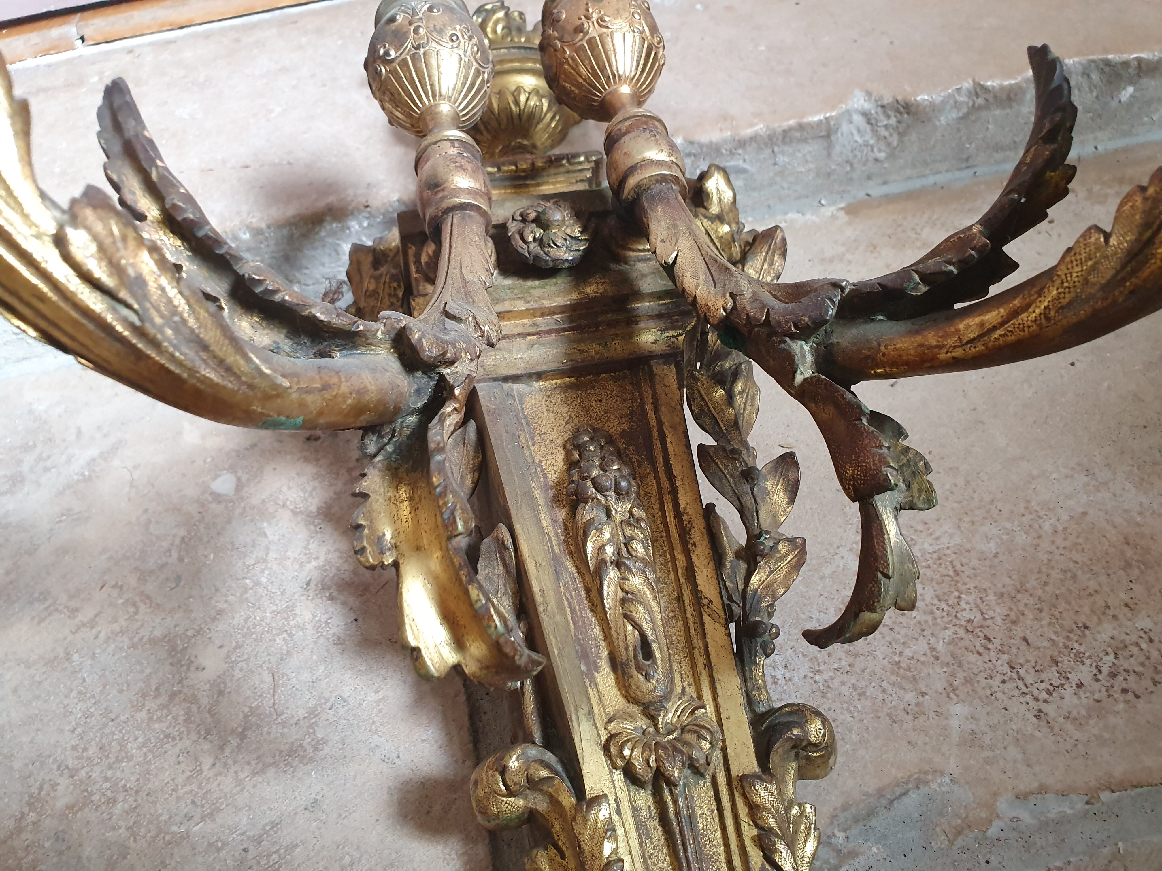 Pair of gold bronze sconces