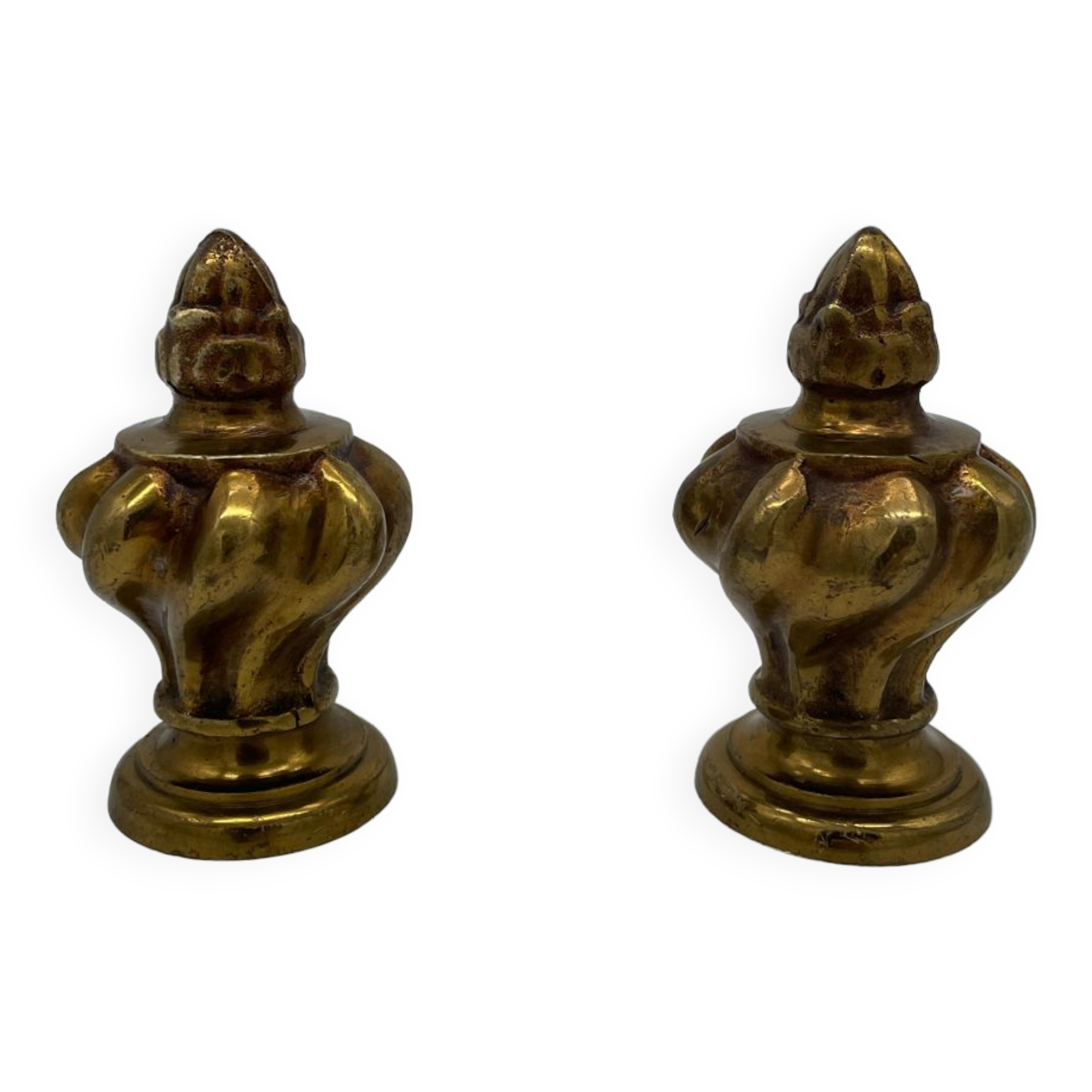 Pair of antique flame curtain rod finials in gilded bronze