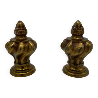 Pair of antique flame curtain rod finials in gilded bronze