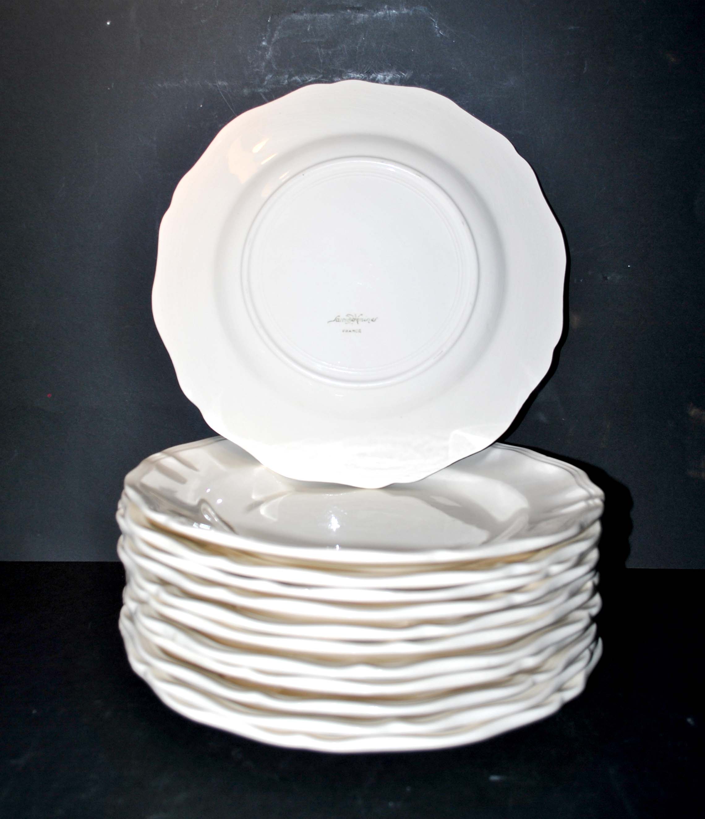 Sarreguemines series of 12 flat plates in opaque faience cream "terre de fer"