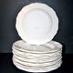 Sarreguemines series of 12 flat plates in opaque faience cream "terre de fer"
