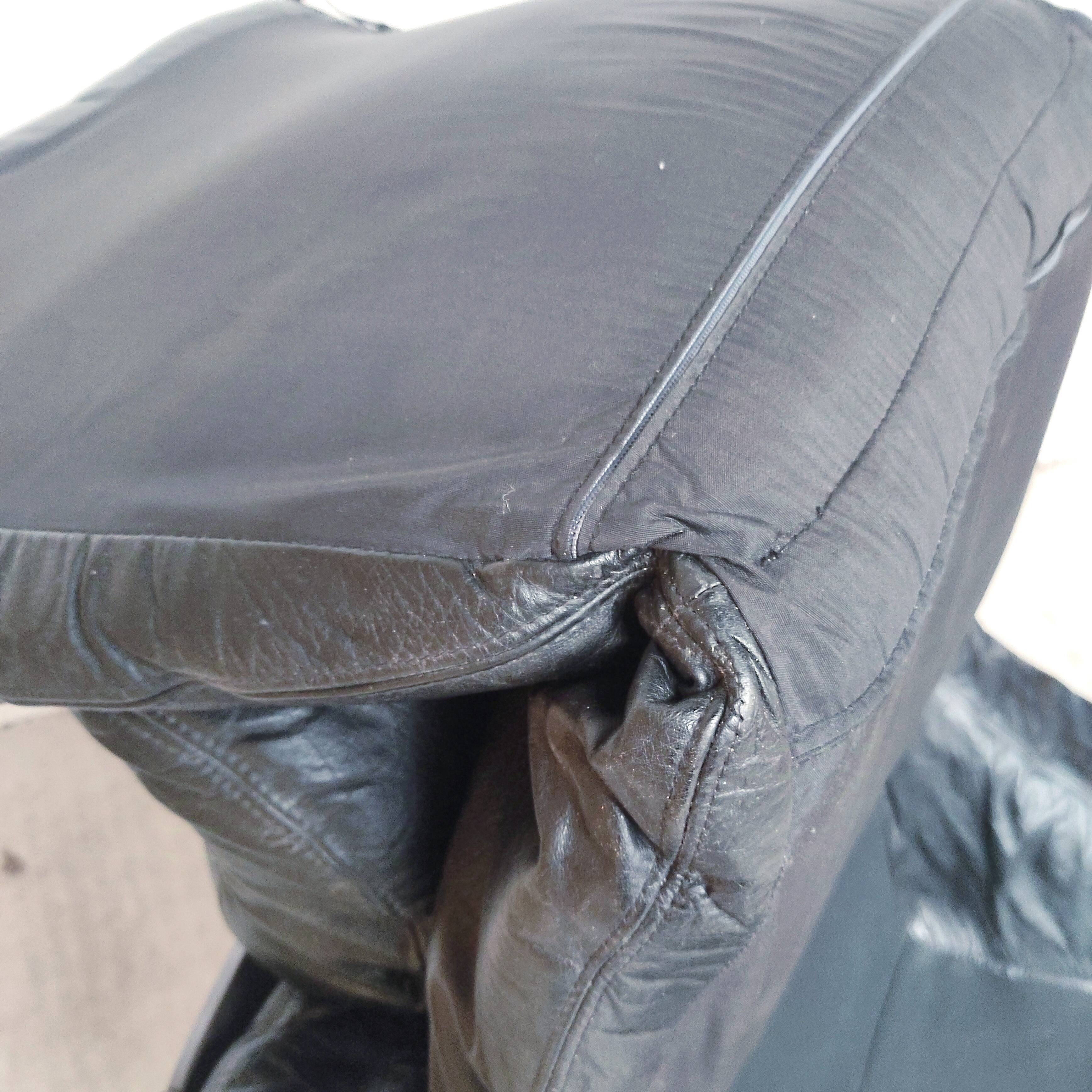 Pair of Kroken armchairs in black leather