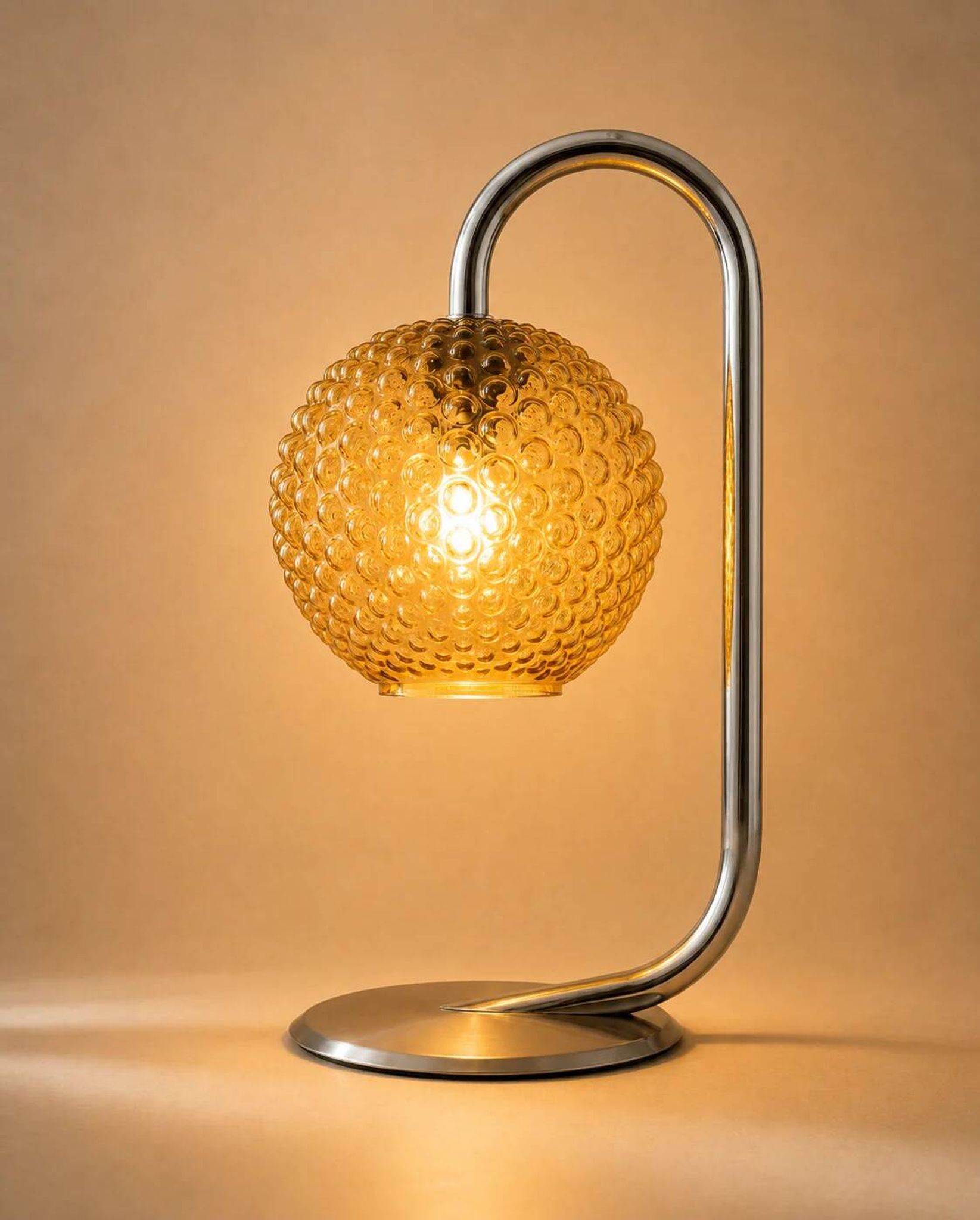 Chrome and amber glass table lamp, attributed to Rolf Krüger, 1970s.