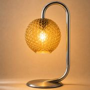 Chrome and amber glass table lamp, attributed to Rolf Krüger, 1970s.