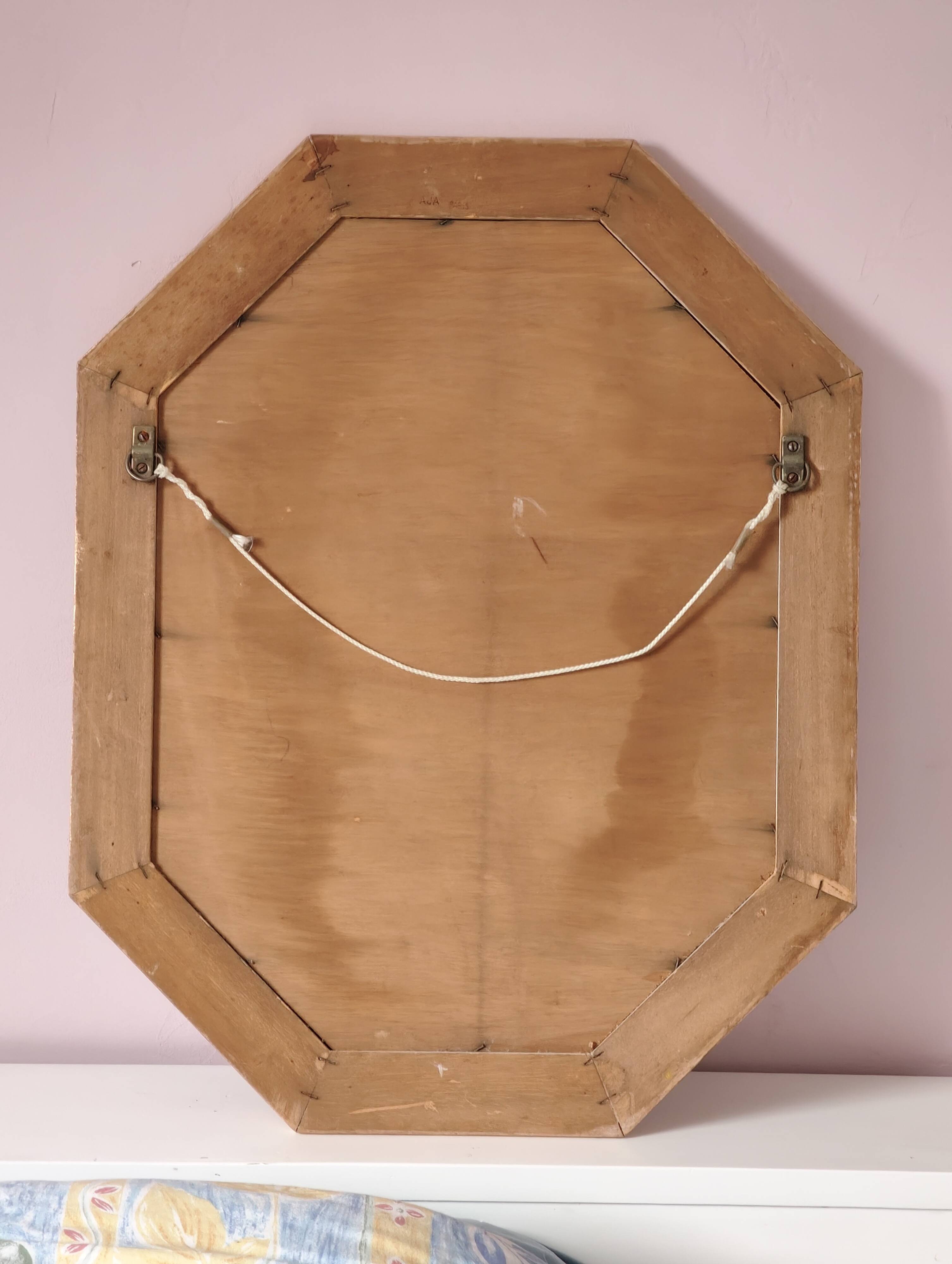 Antique mirror with gilded wooden frame.