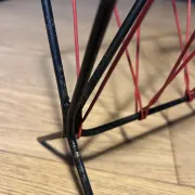 Vintage red and black scoubidou magazine rack, 1950s/60s