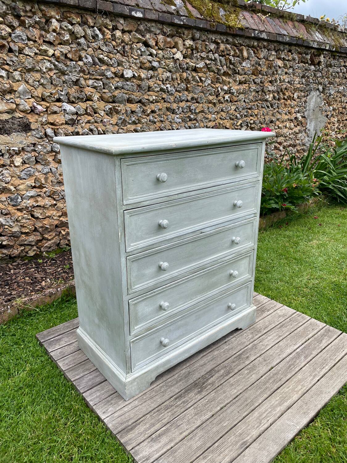 Vintage chest of drawers with white patina