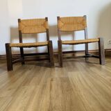 Pair of low wooden and straw armchairs