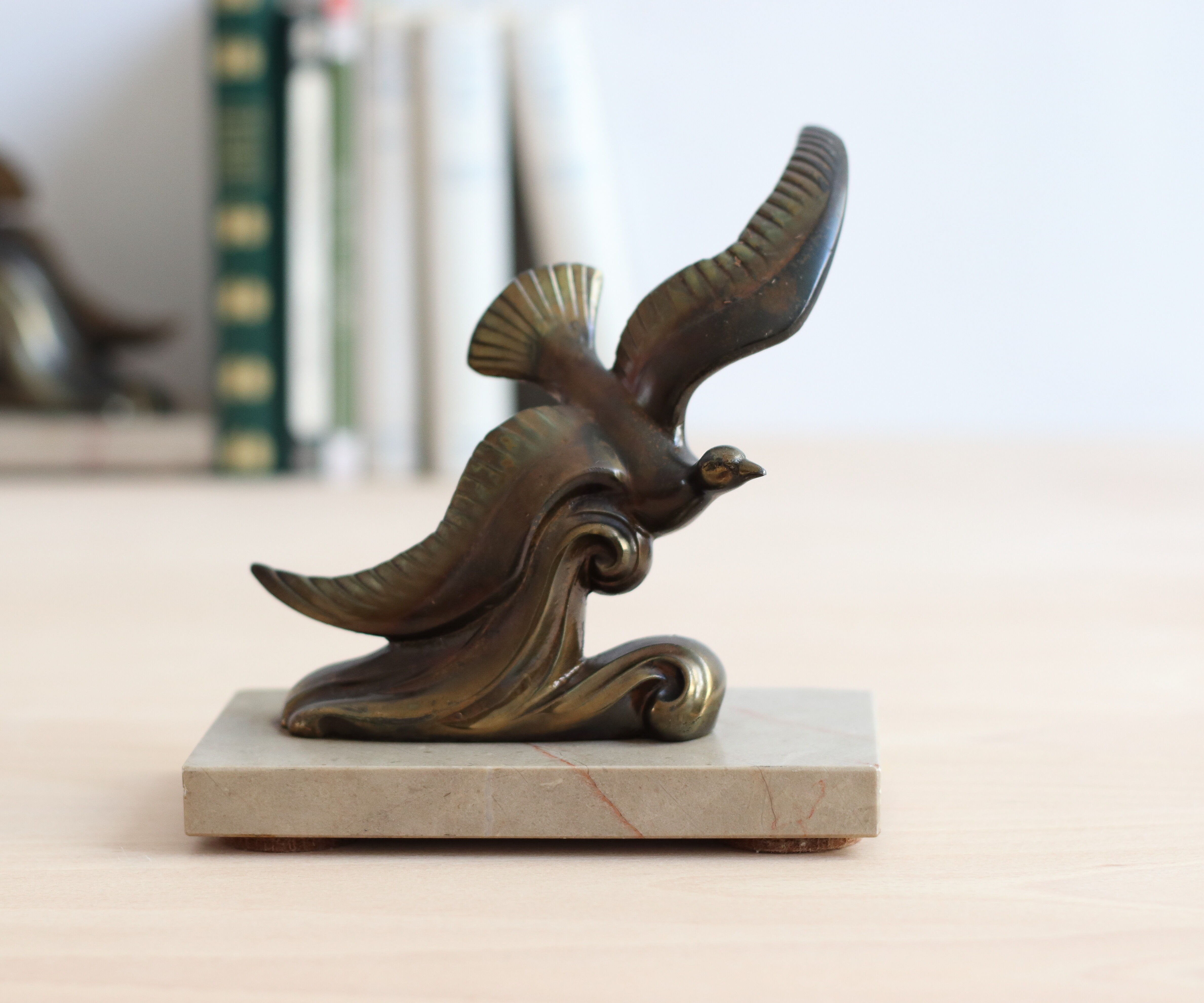 Pair of art deco seagull bookends in regulation and marble