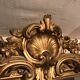 Large antique mirror with flagship shell in wood and gilded stucco