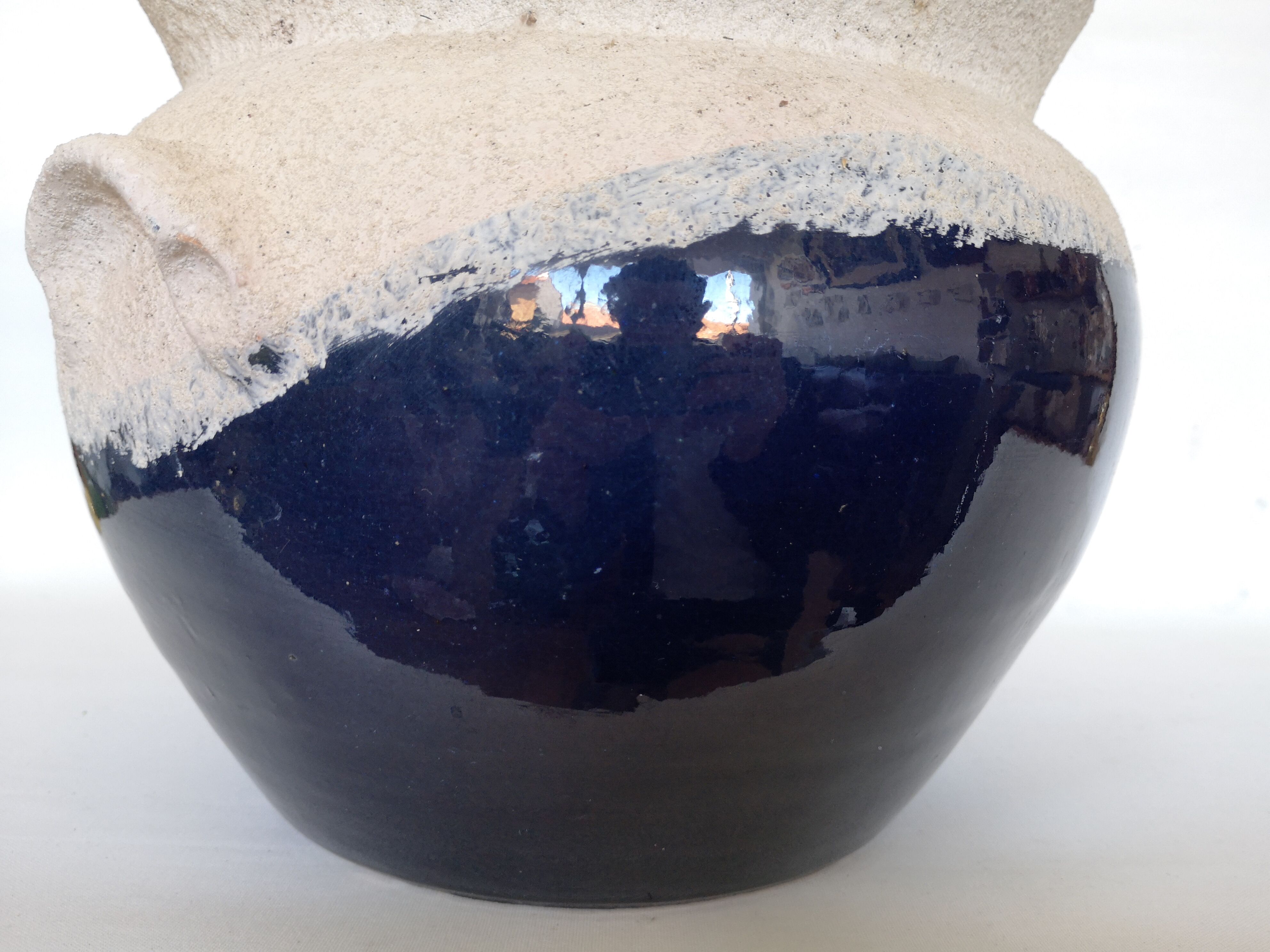 Blue enamelled terracotta pot