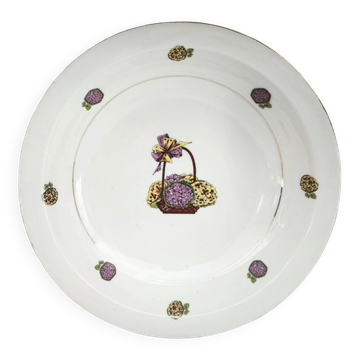 Shallow round plate in Limoges porcelain with a hydrangea basket design.