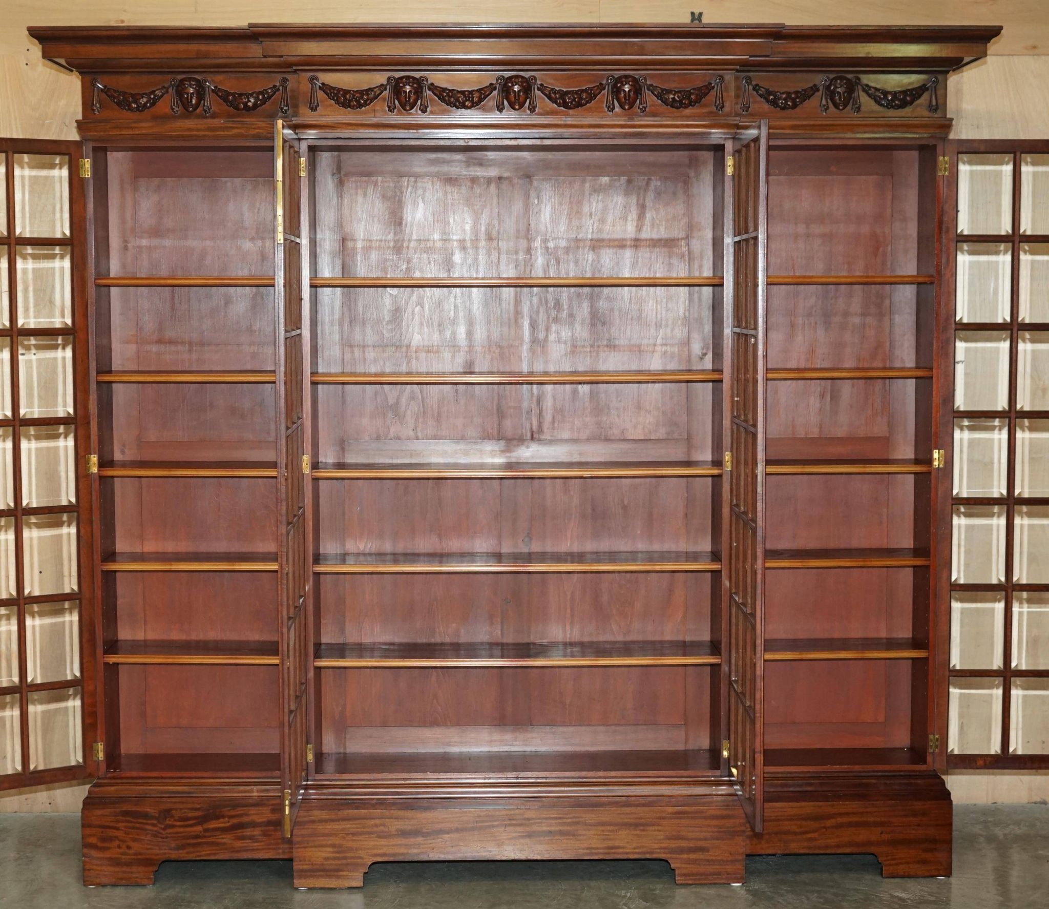 Monumental glass library in Victorian hardwood.