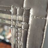 Tin mirror on brutalist wood support