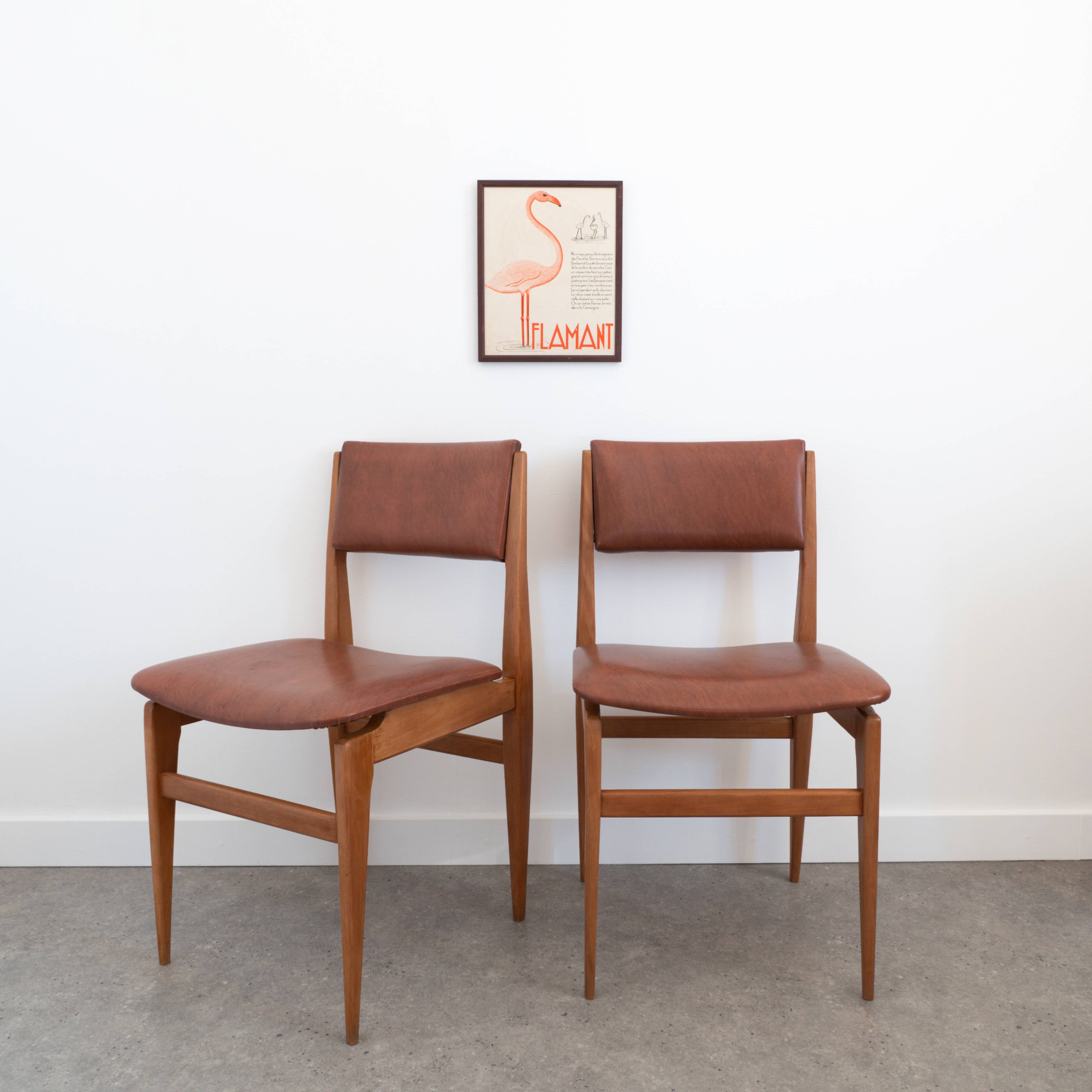 Pair of chairs in wood and brown skaï