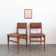 Pair of chairs in wood and brown skaï