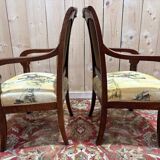 Pair of 19th-century armchairs with a scrolled back