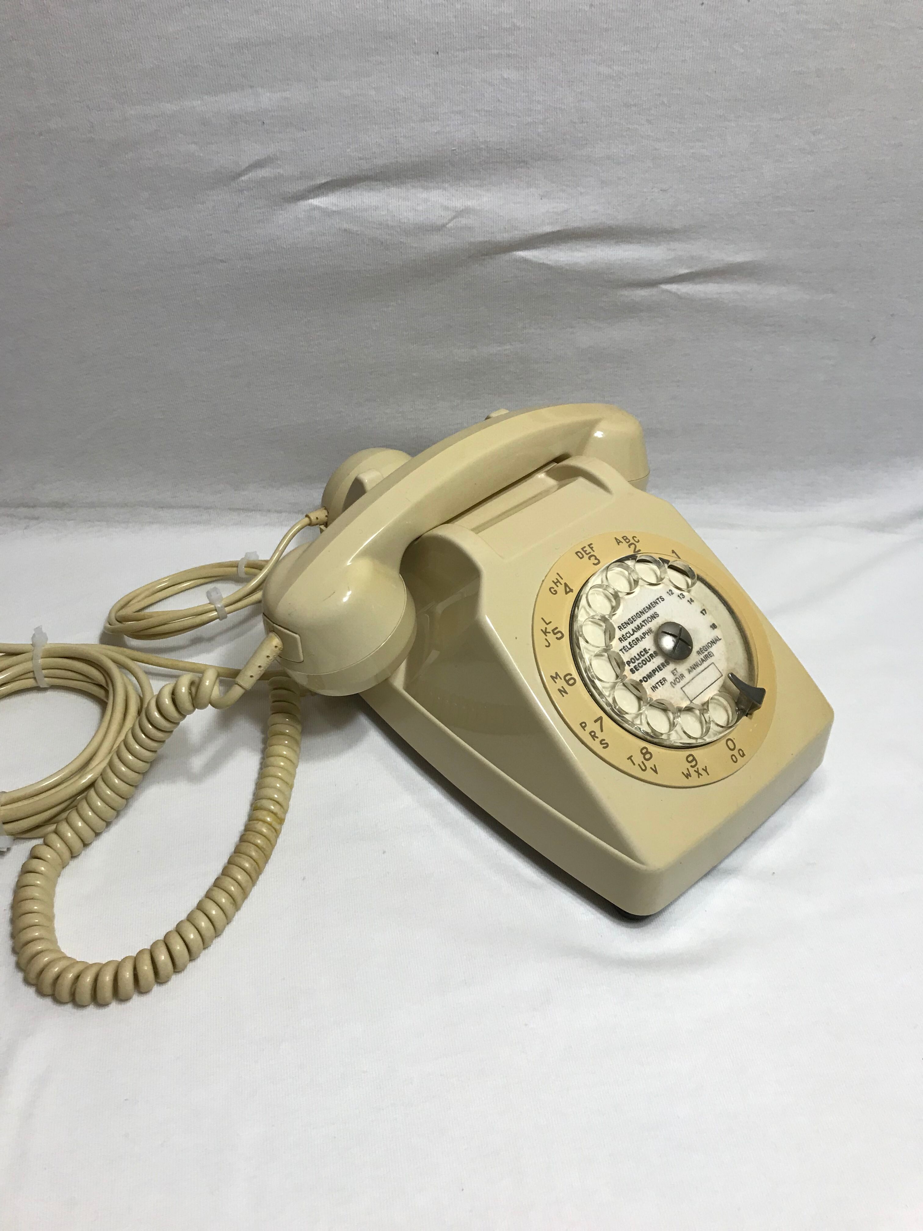 Old white dial phone beige dial, earphone, vintage velvet cover